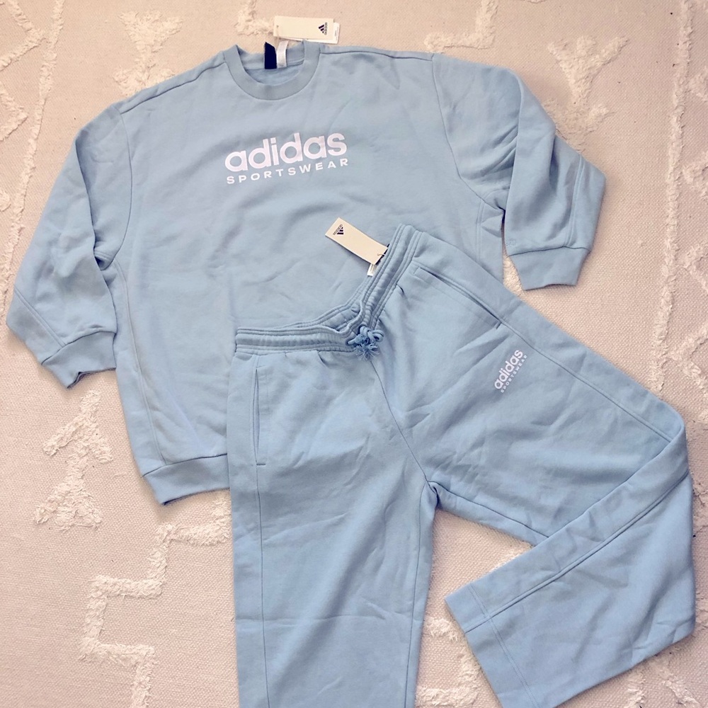 Sky blue Adidas tracksuit brand new never worn!